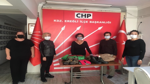 İhtiyaç sahiplerine bot ve mont yardımı yapıldı...